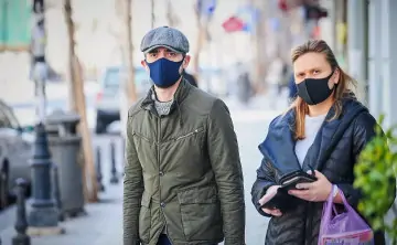 Люди в медицинских масках. Фото © Sputnik / Alex Shlamov