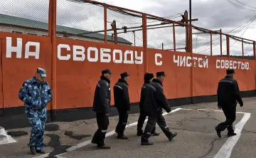 Осуждённые в колонии. Фото Евгений Епанчинцев / ТАСС.