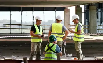 Строители. Фото Романа Соколова, ТАСС