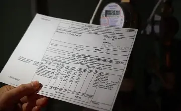 Квитанция ЖКХ. Фото Дмитрий Коротаев, ИЗВЕСТИЯ