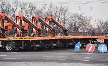 Эвакуаторы. Фото: Дмитрия Духанина, «Коммерсантъ»