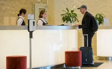 Заселение в гостиницу. Фото Валентина Антонова, ТАСС