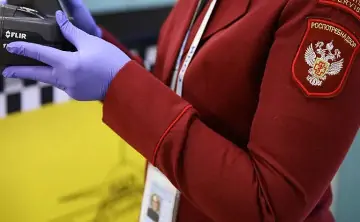 Сотрудник Роспотребнадзора. Фото Виталия Тимкив, РИА Новости