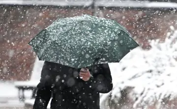 Дождь со снегом. Фото Михаила Воскресенского, РИА Новости