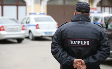 Полицейский. Фото Артема Коротаева, ТАСС